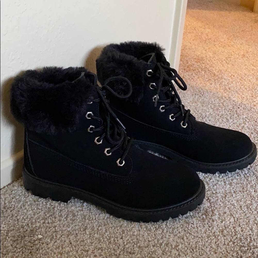 Black combat booties with fur trim